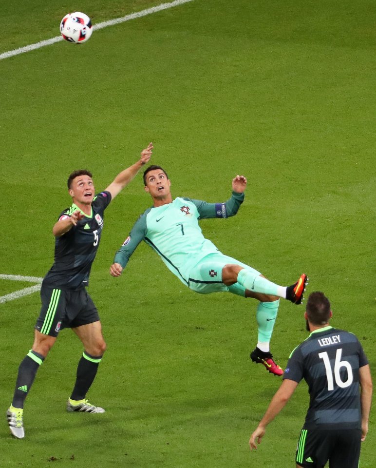  Cristiano Ronaldo attempts an early bicycle kick against James Chester but the Portuguese fluffs his lines