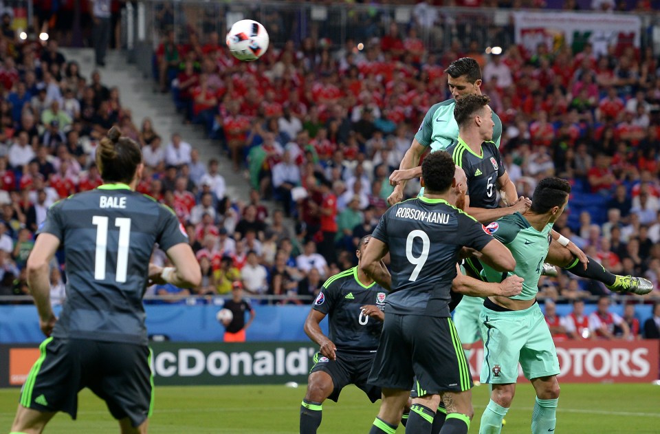  Cristiano Ronaldo rises tall to score Portugal's opener against Wales in Lyon