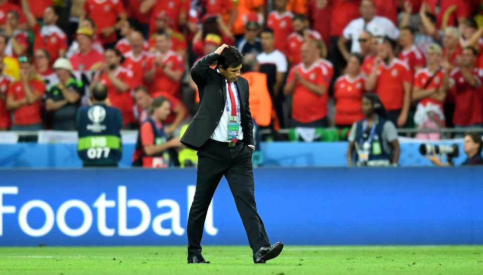 LYON, FRANCE - JULY 06: Chris Coleman manager of Wales reacts to defeat on the pitch after the UEFA EURO 2016 semi final match between Portugal and Wales at Stade des Lumieres on July 6, 2016 in Lyon, France. (Photo by Michael Regan/Getty Images)