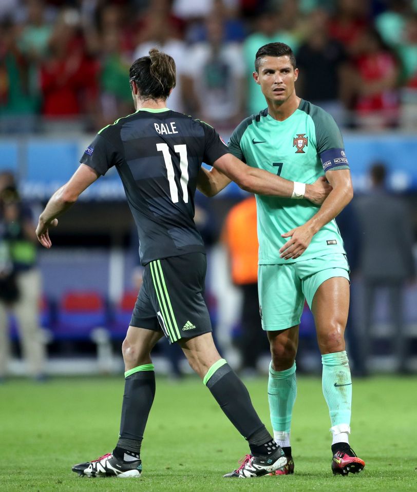 Gareth Bale and Cristiano Ronaldo share a handshake after the final whistle as Portugal beat Wales