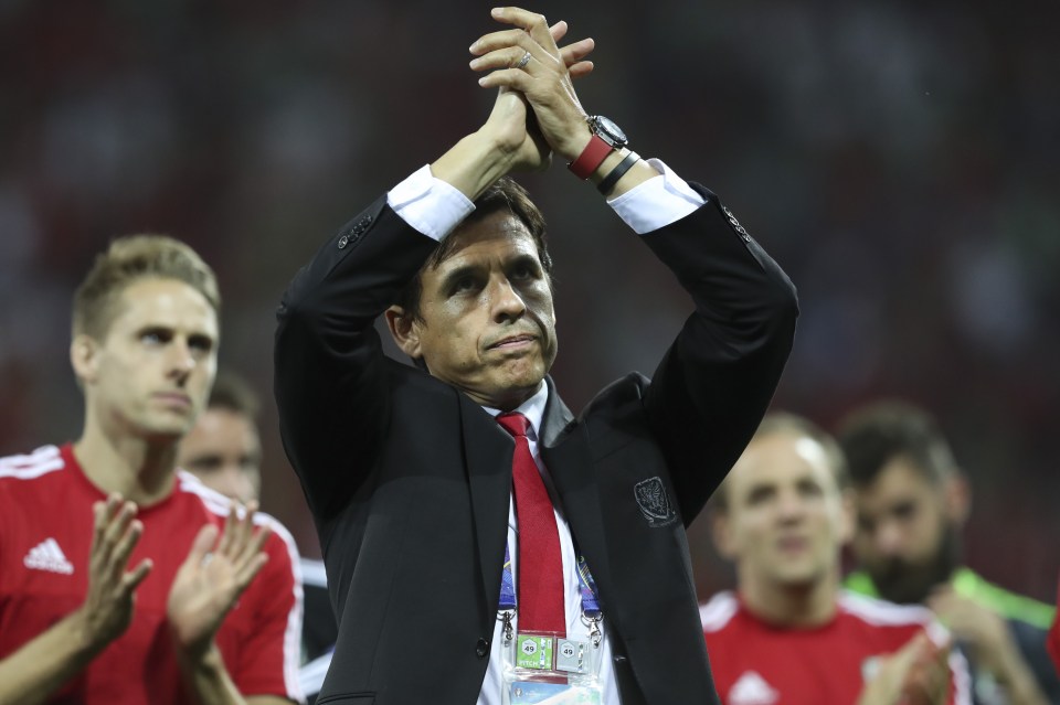 Wales coach Chris Coleman acknowledges the fans at the end of the Euro 2016 semifinal soccer match between Portugal and Wales, at the Grand Stade in Decines-¿Charpieu, near Lyon, France, Wednesday, July 6, 2016. Portugal won 2-0. (AP Photo/Thanassis Stavrakis)