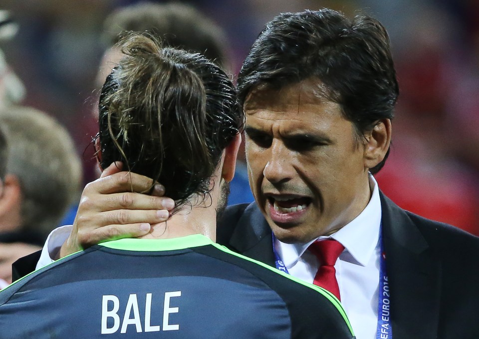 LYON, FRANCE - JULY 6, 2016: Wales' Gareth Bale (L) talks to head coach Chris Coleman after the 2016 UEFA European Football Championship semifinal match against Portugal at Stade de Lyon. Team Portugal won the game 2-0. Alexander Demianchuk/TASS (Photo by Alexander DemianchukTASS via Getty Images)