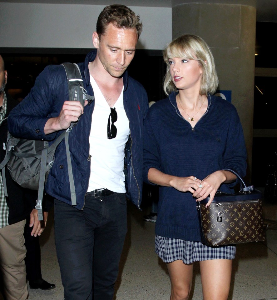 FAMEFLYNET - Tom Hiddleston And Taylor Swift Arrive At LAX Airport In Los Angeles