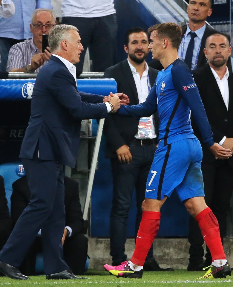  Antoine Griezmann, who has been the star man, shakes hands with Didier Deschamps