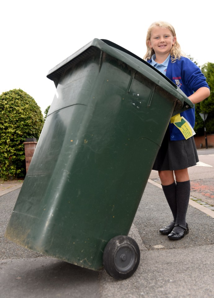 Nine-year-old Lacey McMillan put binmen to shame by dragging rubbish to the side of the road herself