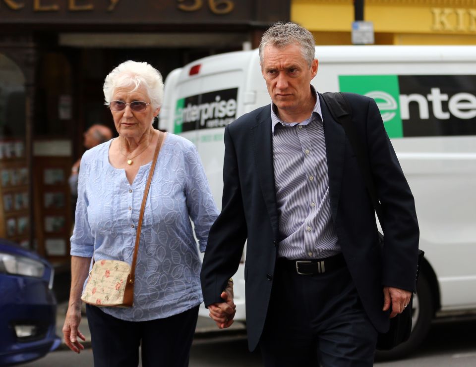  Maureen Lock (left) widow of Donald Lock, and her son Andrew, arrive at Lewes Crown Court in East Sussex today