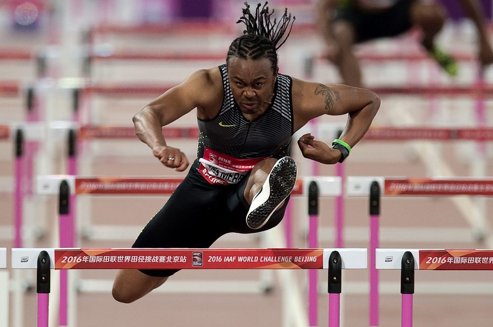 Aries Merritt of the US competes during the men's 110m hurdles