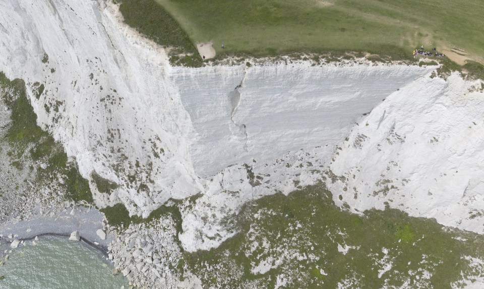  Walkers have been warned as cracks can stretch back up to 49 feet into the chalk.