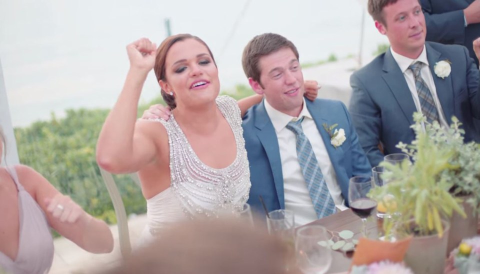 The bride and groom clearly enjoyed the surprise performance 