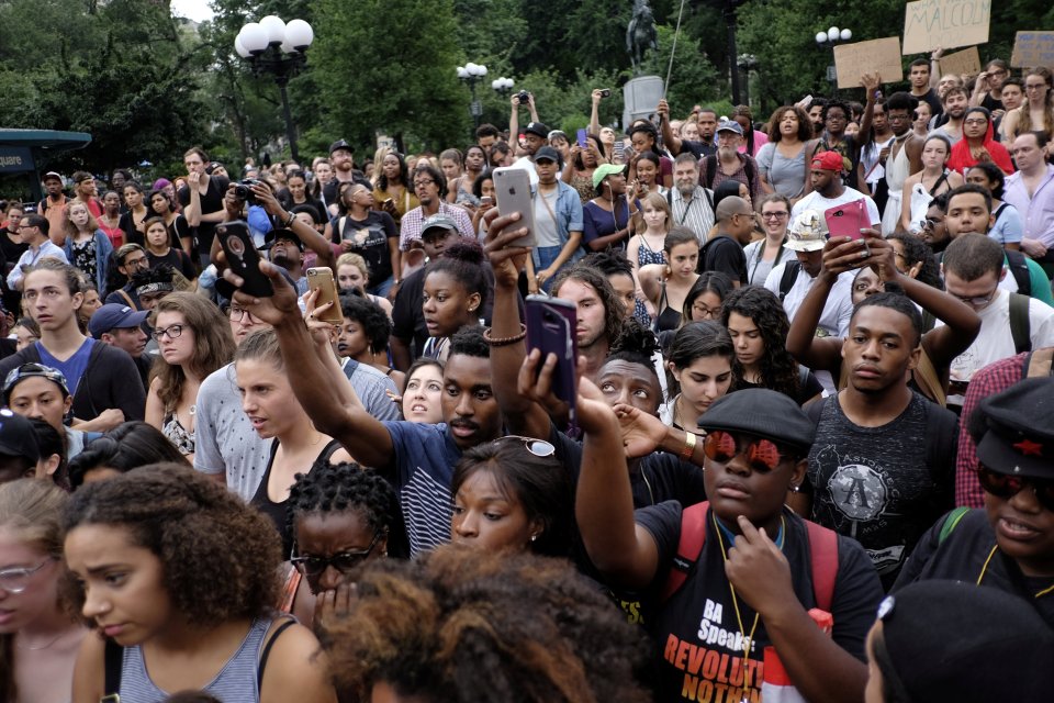  Protesters march in Manhattan, New York, after the shootings of Alton Sterling and Philando Castile