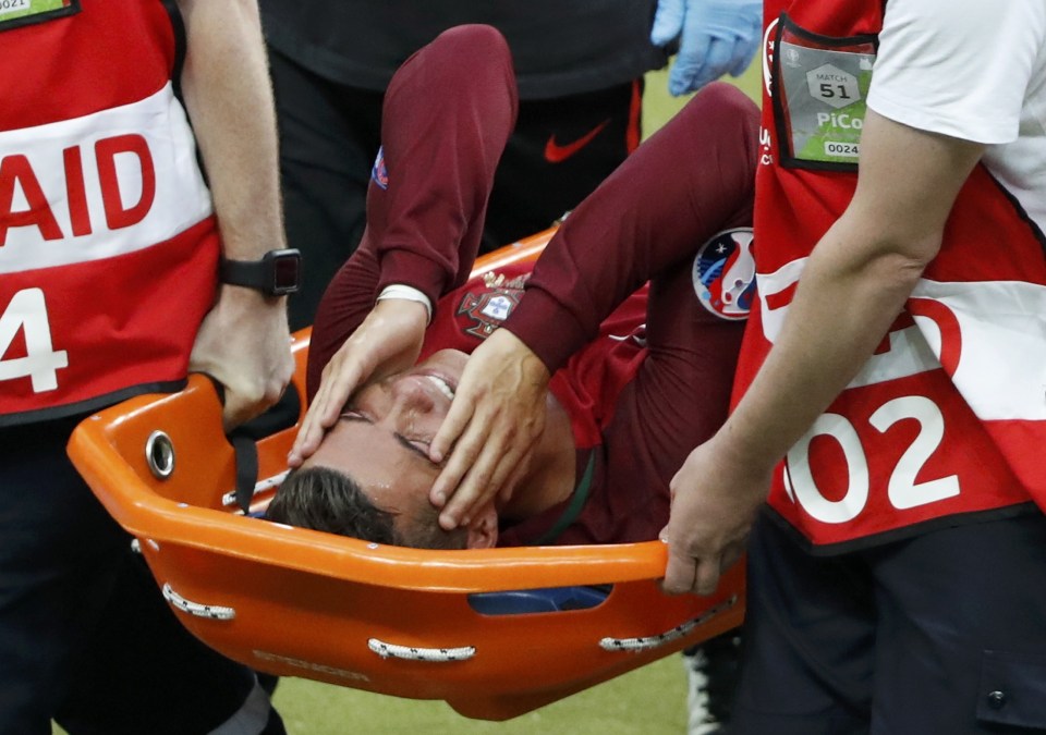 The emotion is too much for Cristiano Ronaldo as he is carried off on a stretcher in the Euro 2016 final between France and Portugal