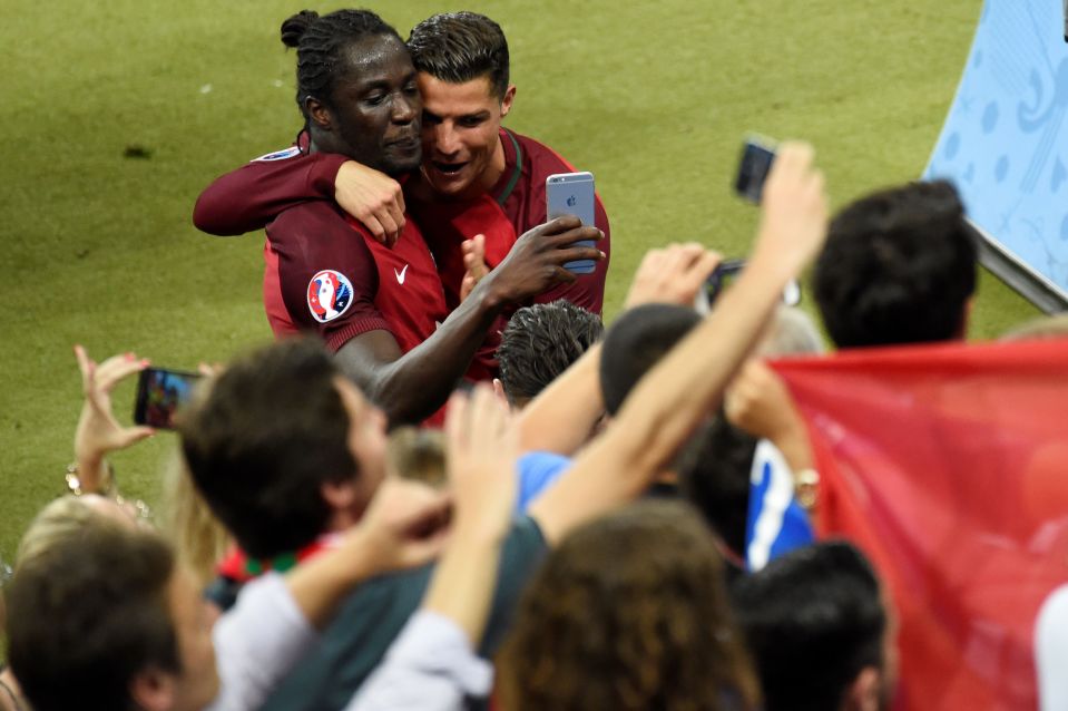 Cristiano Ronaldo hugs Eder for scoring and winning against France at Euro 2016