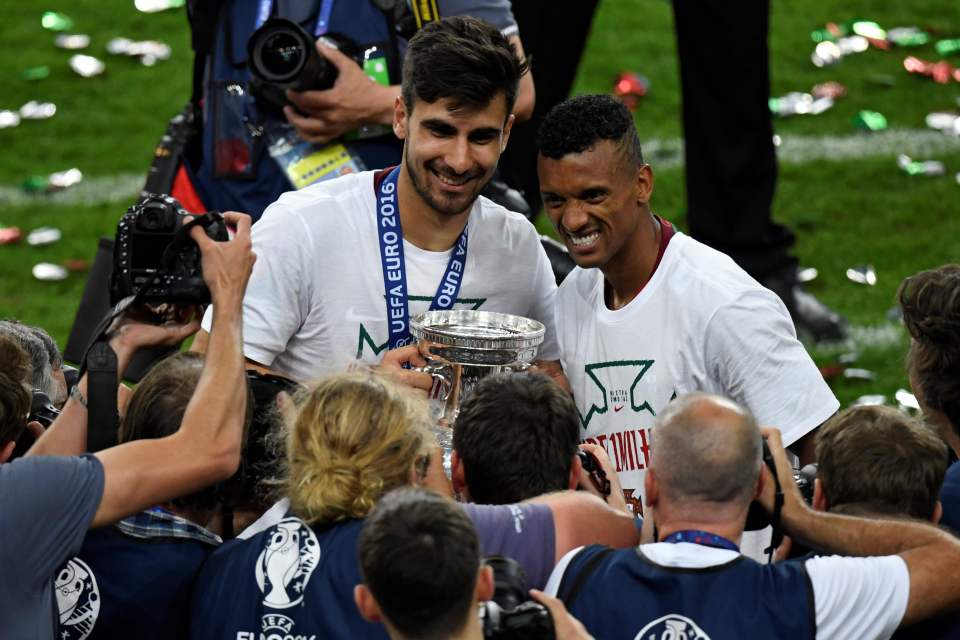 Gomes and Nani pose with the Euro 2016 trophy in Paris