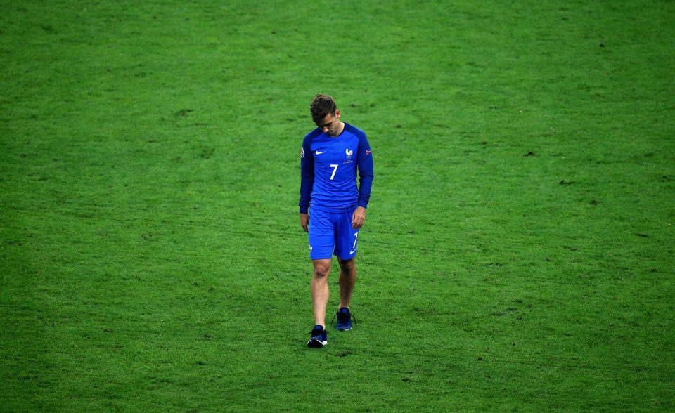  Griezmann cut a dejected figure after France lost the final to Portugal