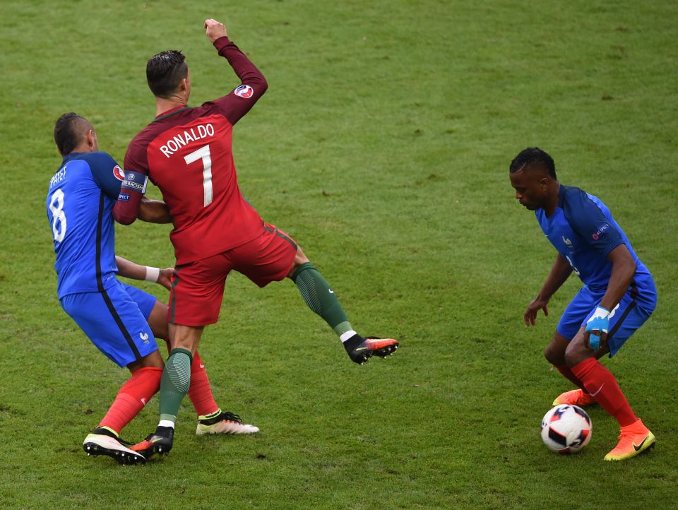  Cristiano Ronaldo is fouled by Dimitri Payet during Euro 2016 final