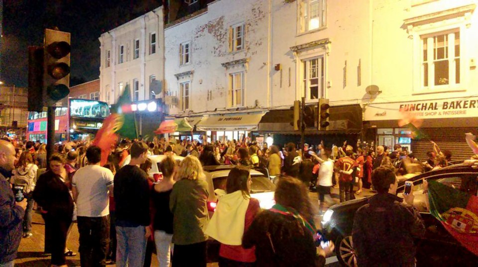  Portugal fans flooded the streets of London to celebrate their nation's big win in the Euro final last night