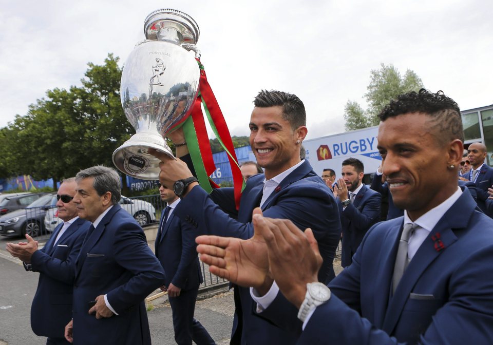  A triumphant Cristiano Ronaldo carries the European Cup to Orly airport