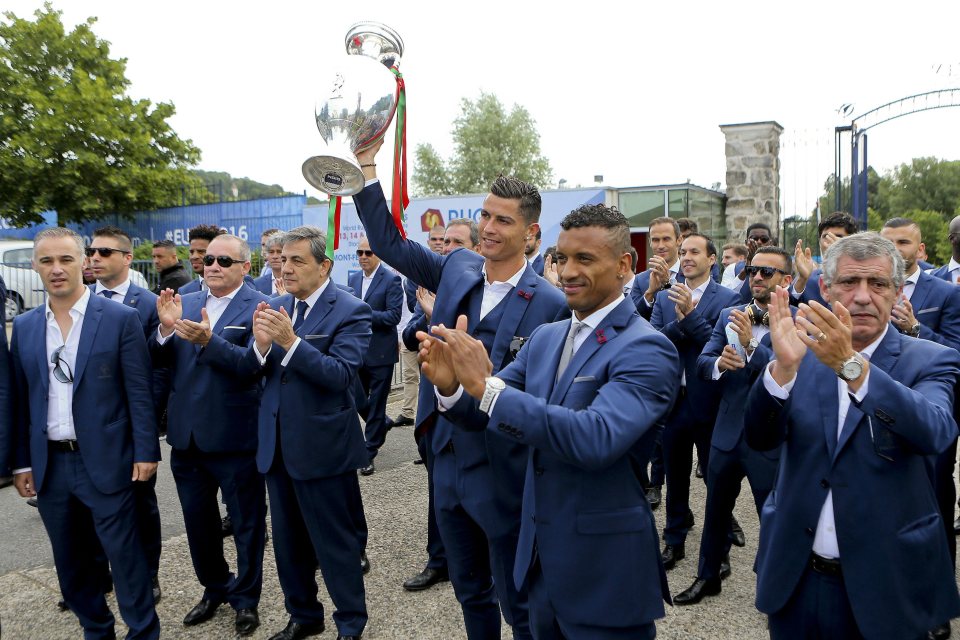  Cristiano Ronaldo brings the cup to Orly airport today as the Portugal squad fly back to Lisbon