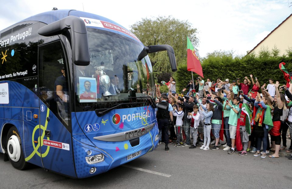  Supporters applaud the Portugal team at departure from Marcoussis near Paris