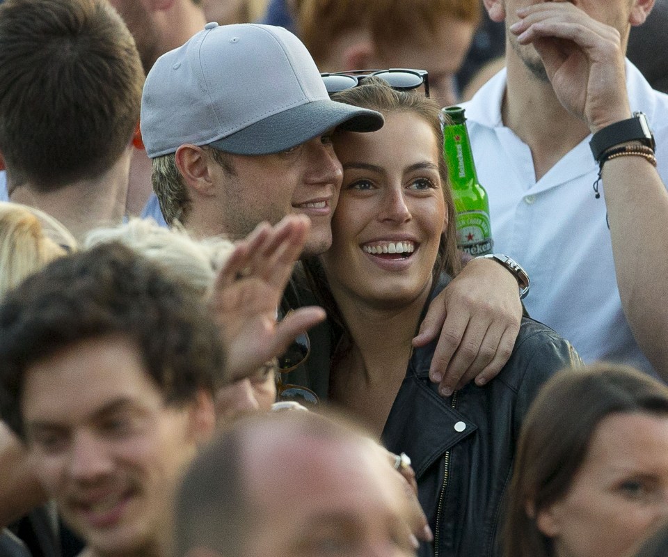  The couple's loved up behaviour is set to break the hearts of thousand of 1D fans