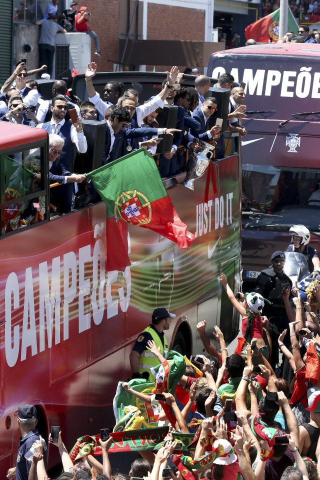  Portugal players celebrate their triumph the fans in Lisbon