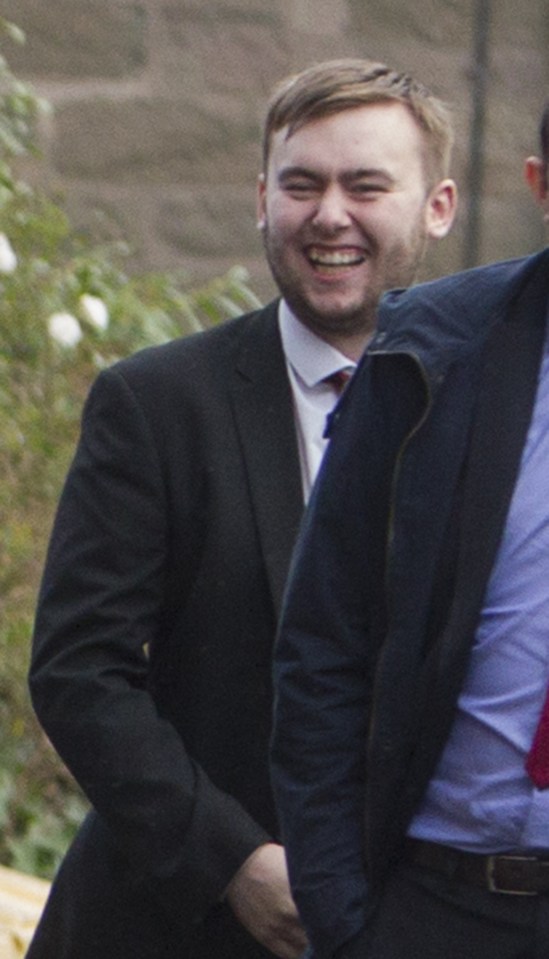  Smiling yob... Ryan Lawrence faces a lifelong stadium band after running on the pitch to attack Mr Douglas