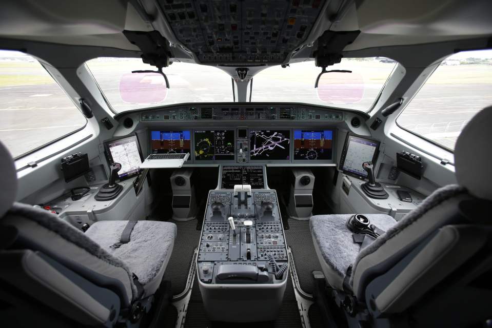  The inside of the cockpit of the Bombardier CS100 with the aircraft revealed at the Farnborough Airshow