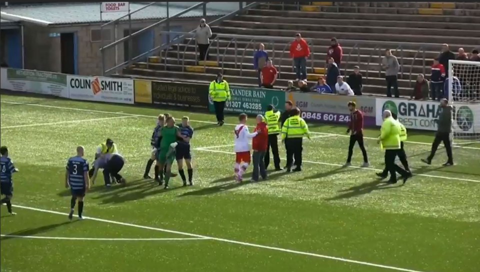  Marshals tackle the hooligans as his teammates rush in