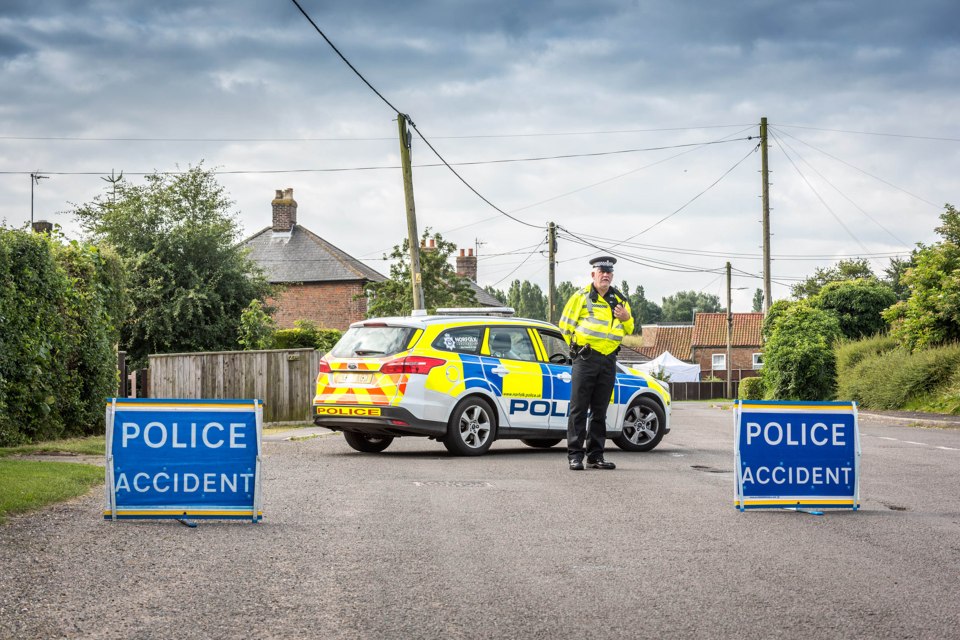  Emergency services remain at the scene as police investigate the suspected murder-suicide