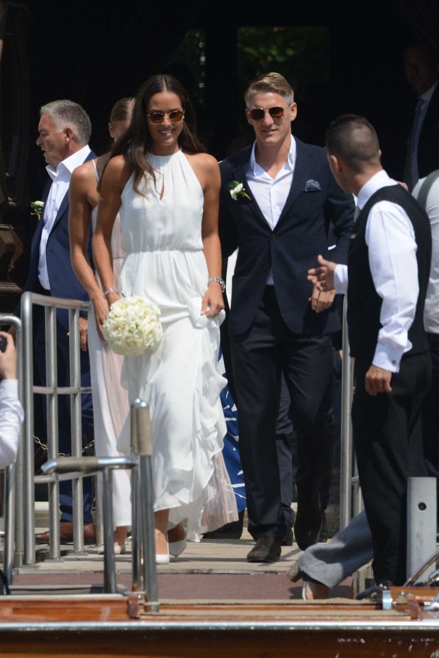  Bastian Schweinsteiger and Ana Ivanovic step out of the city hall in Venice after tying the knot in a civil ceremony