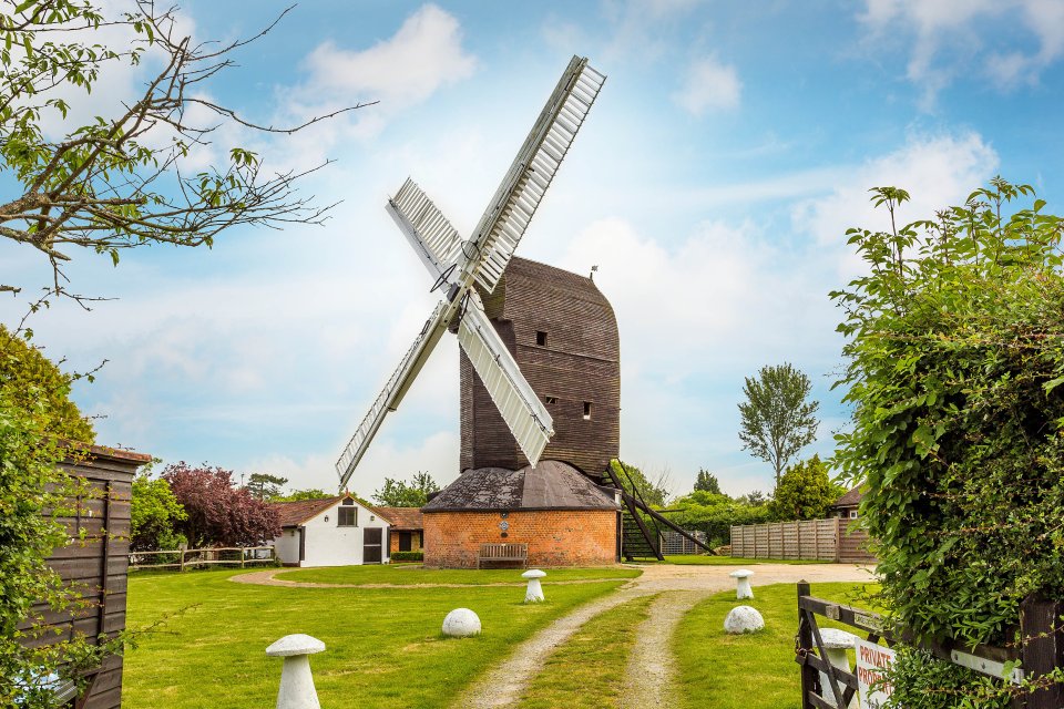  A small barn conversion in Outwood, Surrey, has gone on sale for £800,000... but included in the price is a WINDMILL