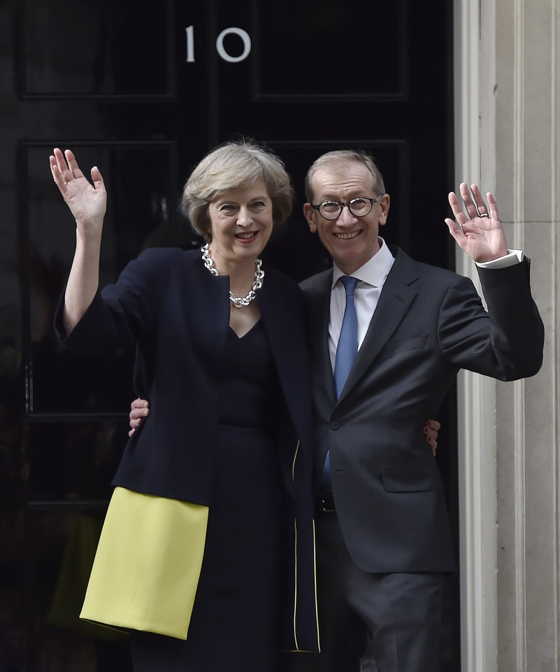  New Prime Minister Theresa May and her husband Philip John outside 10 Downing Street