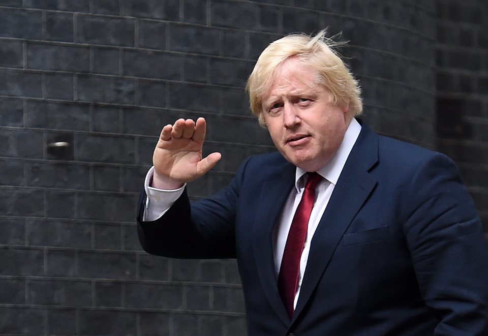  Boris Johnson waves to media as he visits the new British Prime Minister and is given the role of Foreign Secretary