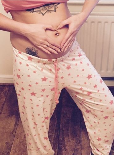  The beauty has been showing off her baby bump on social media