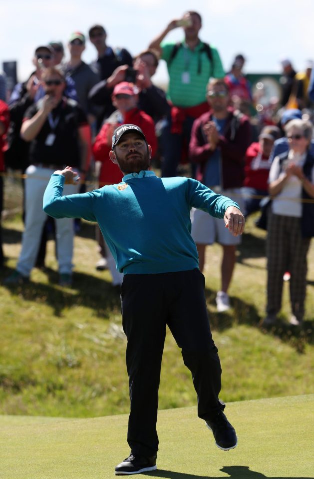  Top South African star Louis Oosthuizen celebrates his hole in one on the 14th