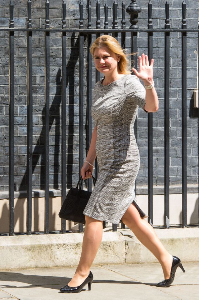  Greening waves to the press as she arrives in Downing Street