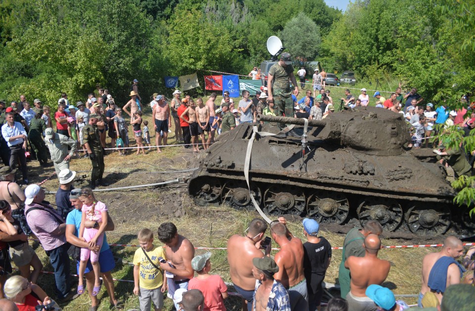  Crowds gathered to watch the recovery operation with the tank having been first discovered in April