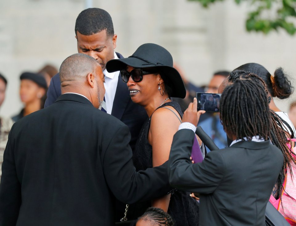  His partner, Diamond Reynolds, fought back tears as she was comforted by members of his family before the service, which was held at St Paul's cathedral in Minnesota