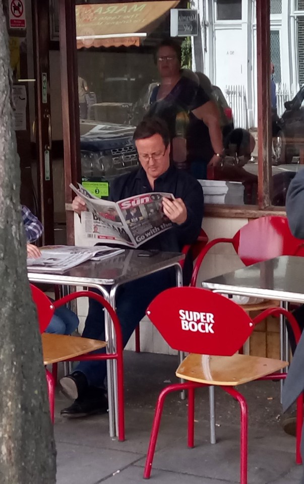  David Cameron chillaxes at a West London cafe reading Britain's favourite newspaper today