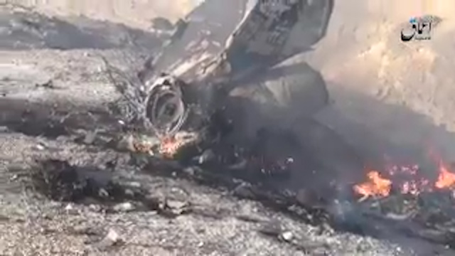  The burning rubble of the plane is seen in the video with the Islamic State claiming responsibility