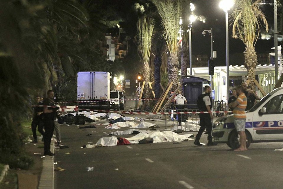  Bodies litter the ground after a truck driver shouting 'allahu akbar' ploughed through crowds celebrating Bastille Day