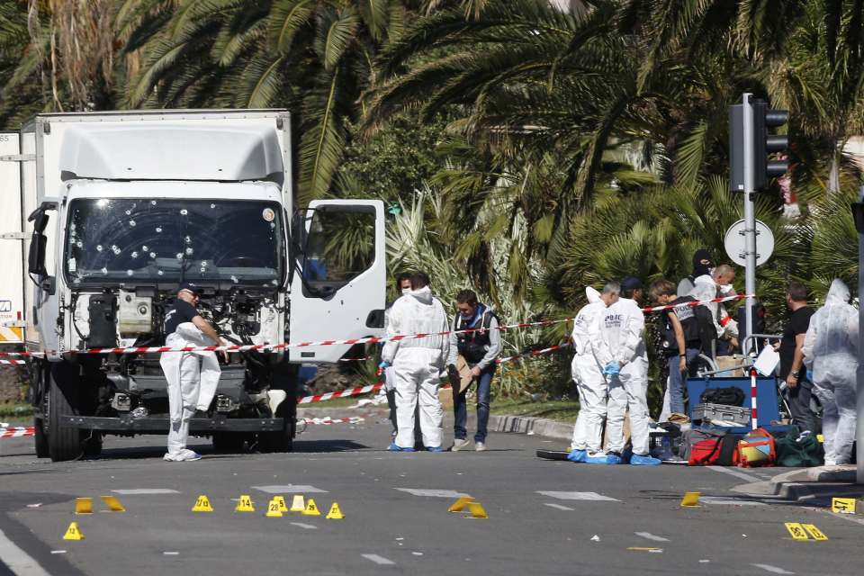  The lorry used by the murder, pictured the day after the attack, with bullet holes covering the windscreen