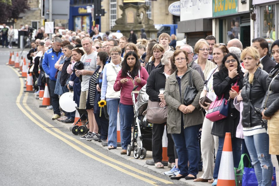 The streets of Yorkshire are filled with crowds desperate to pay their respects as the hearse drives past