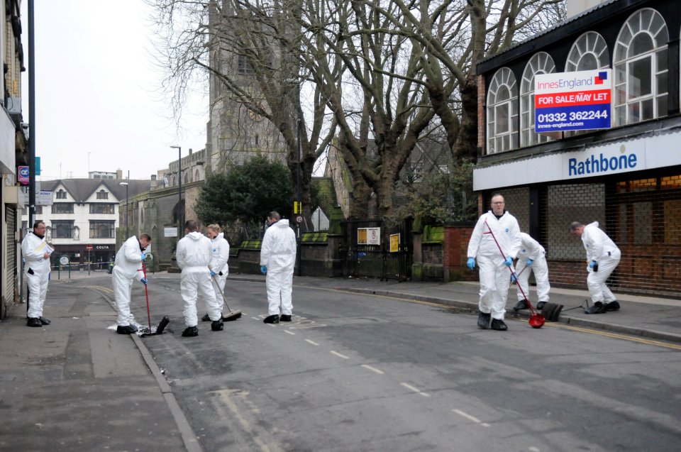 Police at the scene of the fatal stabbing of Tom Webb in Derby City Centre