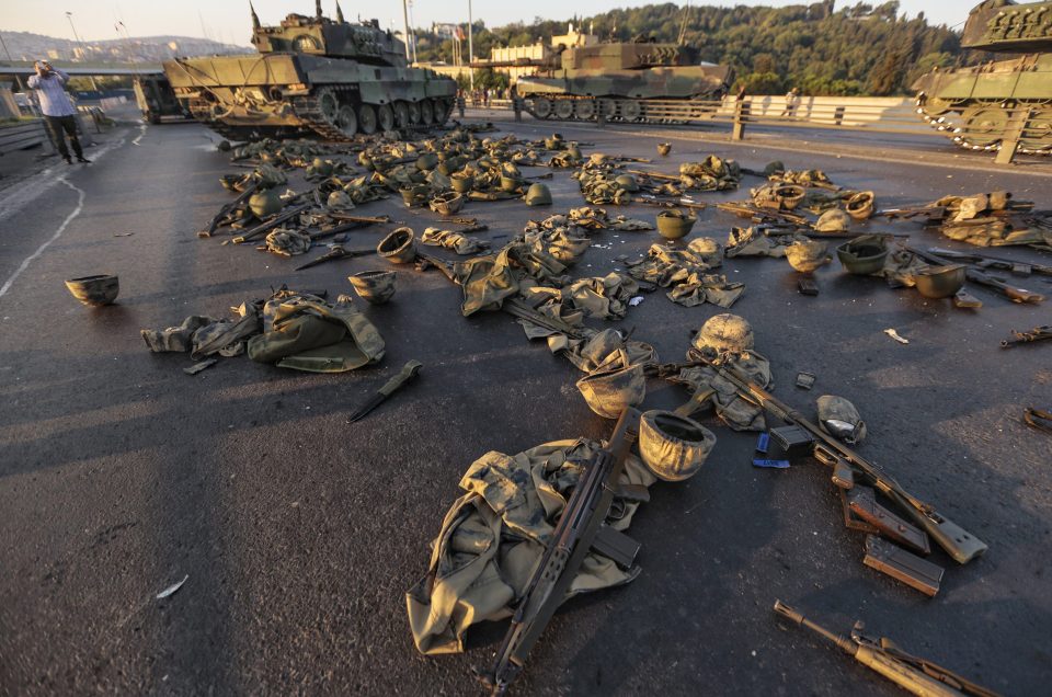 Clothes and weapons belonging to soldiers involved in the coup attempt that have now surrendered lie on the ground abandoned 