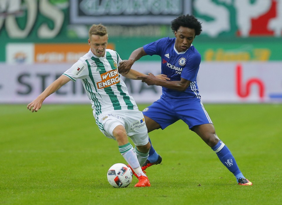 Football Soccer - Rapid Vienna v Chelsea - Pre Season Friendly - Allianz Stadion, Vienna, Austria - 16/7/16 Chelsea's Willian and Rapid Vienna's Philipp Schobesberger in action Action Images via Reuters / Heinz-Peter Bader Livepic EDITORIAL USE ONLY.