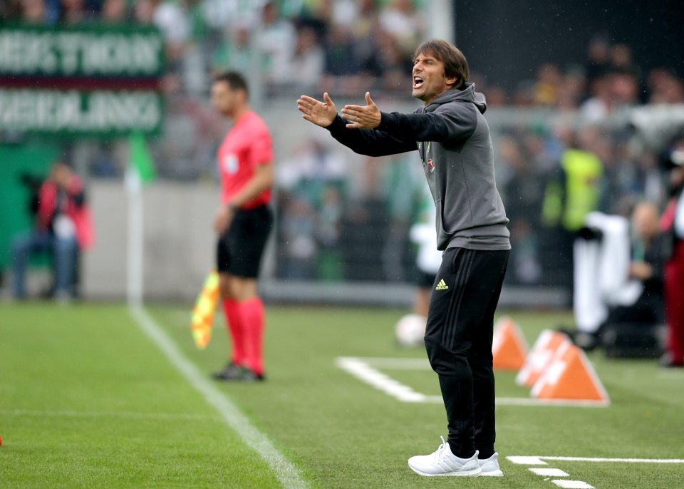 epa05428244 Chelsea FC's manager Antonio Conte reacts during the friendly soccer match between SK Rapid Vienna and Chelsea FC at the newly built Allianz Stadion in Vienna, Austria, on 16 July, 2016. SK Rapid Wien's new home side was officially opened today by a ceremony reaching its highlight in the soccer game agianst England's Chelsea FC. EPA/LISI NIESNER