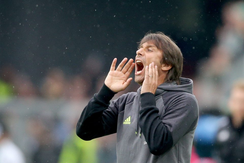 epa05428243 Chelsea FC's manager Antonio Conte reacts during the friendly soccer match between SK Rapid Vienna and Chelsea FC at the newly built Allianz Stadion in Vienna, Austria, on 16 July, 2016. SK Rapid Wien's new home side was officially opened today by a ceremony reaching its highlight in the soccer game agianst England's Chelsea FC. EPA/LISI NIESNER