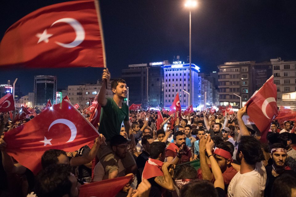 People shouted slogans and waved Turkish flags as they showed their support for the government