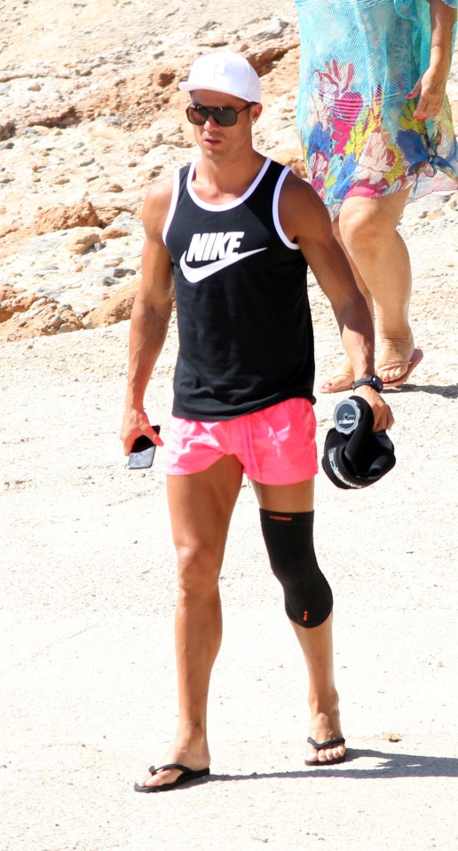  Cristiano Ronaldo sports a leg brace on holiday in Ibiza to help his recovery